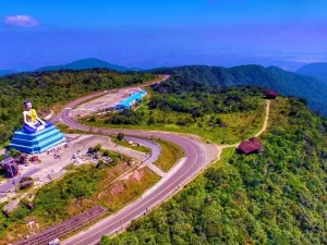 Private Bokor National Park day tour from Phnom Penh, featuring misty mountains, waterfalls, and historic French colonial buildings