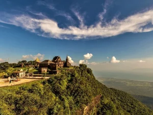 Private Bokor National Park day tour from Phnom Penh, featuring misty mountains, waterfalls, and historic French colonial buildings