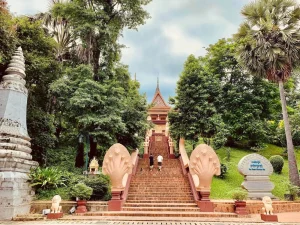 Phnom Penh and Oudong Mountain day tour featuring ancient temples, scenic landscapes, and a visit to a traditional silversmith-making village.